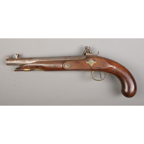 111 - A 19th century flint lock pistol. The lock plate stamped for Wheeler and the barrel having London pr... 