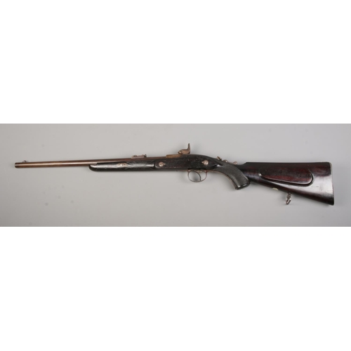 114 - A 19th century Westley Richards & Co monkey tail percussion rifle. Stamped with maker's name and dat... 