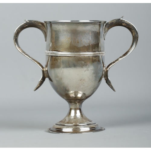 121 - A George III silver twin handled cup. Assayed London 1803 by Peter, Ann & William Bateman. Height 15... 