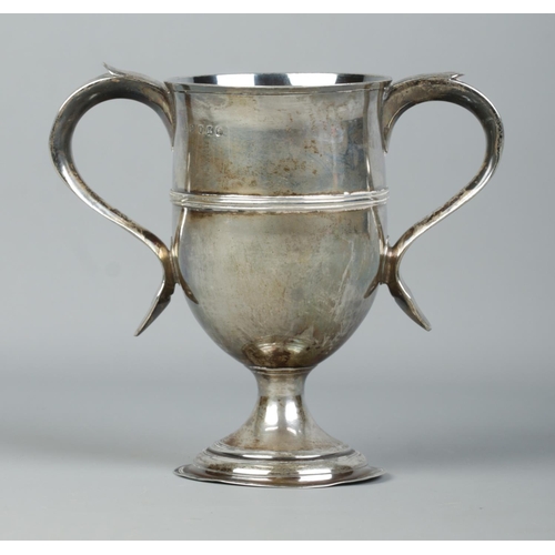 121 - A George III silver twin handled cup. Assayed London 1803 by Peter, Ann & William Bateman. Height 15... 