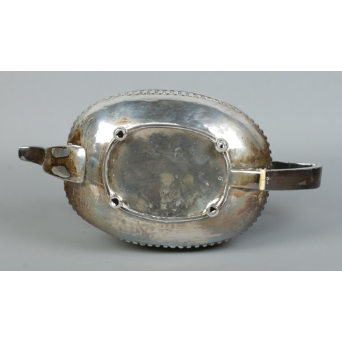 122 - A George III silver teapot raised on four ball feet. Cattle motifs to body. Assayed London 1815. 454... 