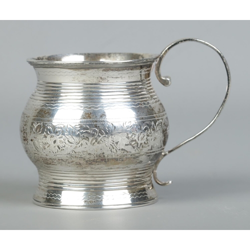 126 - A George III small silver cup with engraved floral and ribbed decoration. Assayed London 1815 by Nap... 