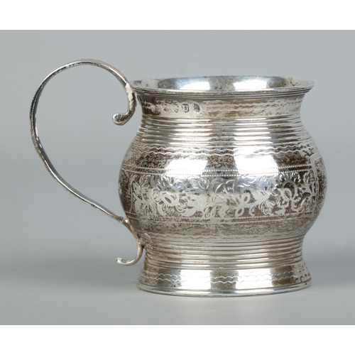 126 - A George III small silver cup with engraved floral and ribbed decoration. Assayed London 1815 by Nap... 