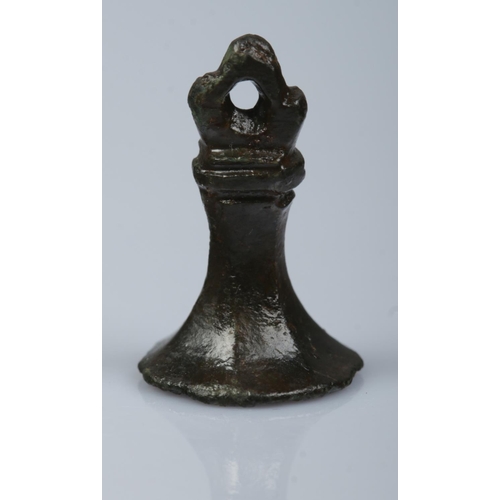 128 - A medieval bronze chessman style seal matrix.