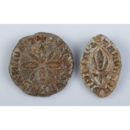 129 - Two medieval lead vesica seals.