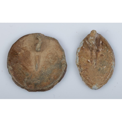 129 - Two medieval lead vesica seals.