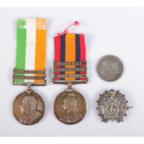 140 - South Africa/Boer War interest; a pair of service medals along with a silver Bedfordshire sweetheart... 