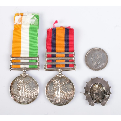 140 - South Africa/Boer War interest; a pair of service medals along with a silver Bedfordshire sweetheart... 