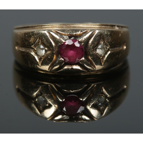 143 - A 9ct gold ruby and paste gypsy style ring. Size T. 5.03g.