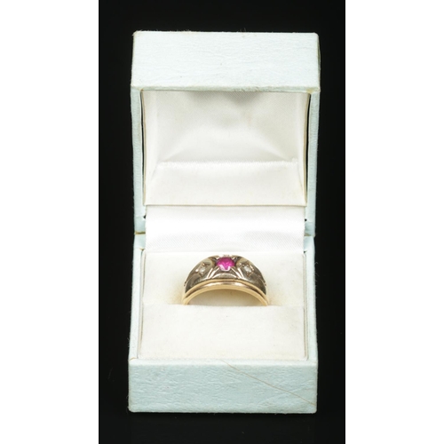 143 - A 9ct gold ruby and paste gypsy style ring. Size T. 5.03g.