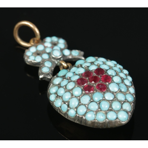 147 - A high carat yellow gold and white metal pendant formed as a bow and heart. Set with turquoise and r... 