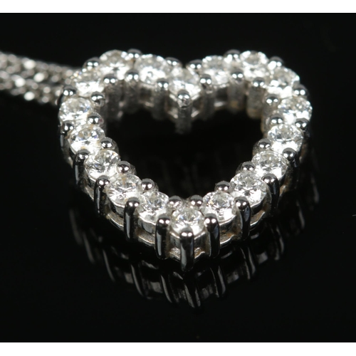 149 - A platinum and diamond heart shaped pendant on 18ct white gold 16 inch chain. Pendant 3.3g, chain 2.... 