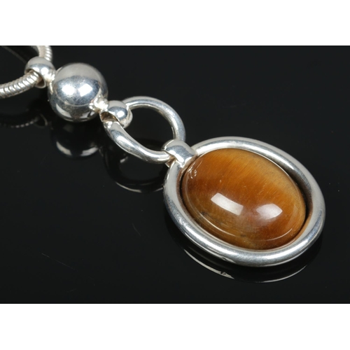 154 - A silver and Chrysoberyl pendant on Brazilian link chain by Grosse Germany.