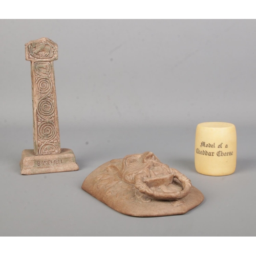 16 - Three pieces of Goss china. Includes Bakewell Cross, Model of a Cheddar Cheese and The Durham Abbey ... 