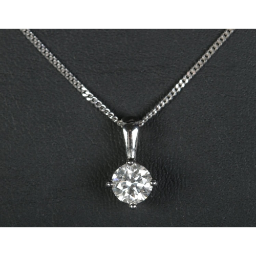 164 - A 18ct white gold and moissanite pendant on 9ct white gold chain. Stone approximately 1ct. Chain len... 