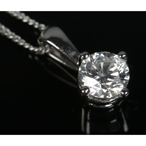 164 - A 18ct white gold and moissanite pendant on 9ct white gold chain. Stone approximately 1ct. Chain len... 