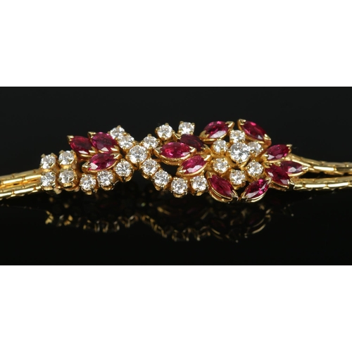 167 - An 18ct gold ruby and diamond bracelet. Having London import marks, 1982. Length 18cm. 15.98g.