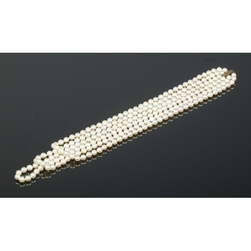 169 - A vintage JKa three row pearl necklace with 9ct gold clasp.