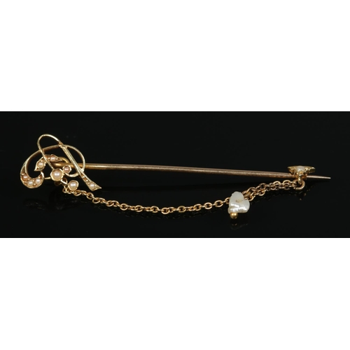 183 - An Edwardian 15ct gold and pearl stick pin. 2.04g.