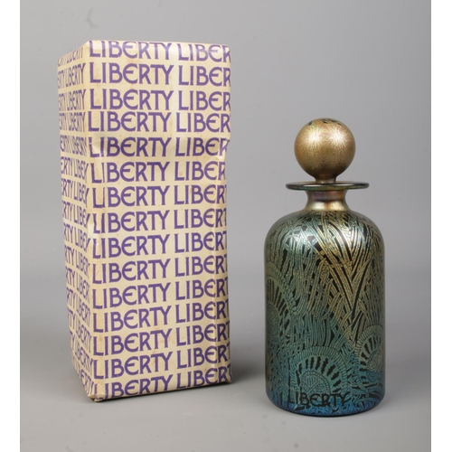 2 - A Liberty's Isle of Wight glass scent bottle from the Golden Peacock collection. With box and origin... 