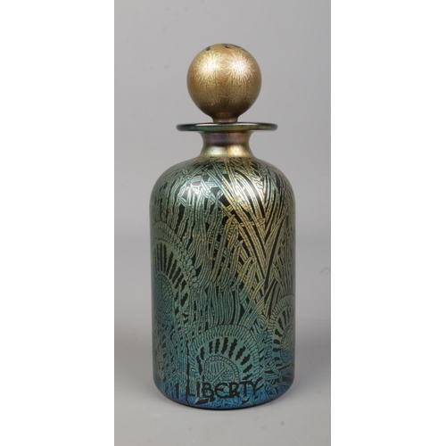 2 - A Liberty's Isle of Wight glass scent bottle from the Golden Peacock collection. With box and origin... 