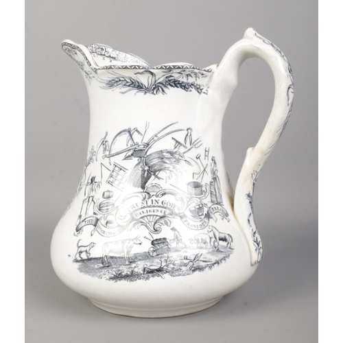 26 - A 19th century Farmers Arms pottery pitcher. 'Industry Produceth Wealth'. Height 19.5cm.