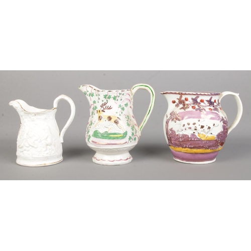 28 - Three 19th century jugs. Includes two lustre hunting jugs and a white glazed example decorated in re... 