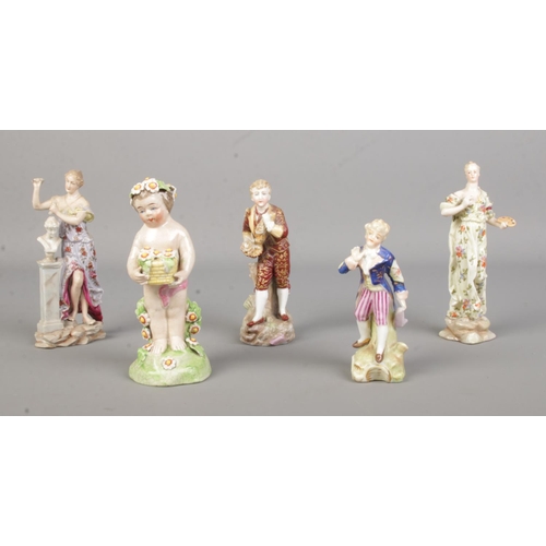 39 - Five small antique porcelain figures. Including sculptor, painter, putto etc.