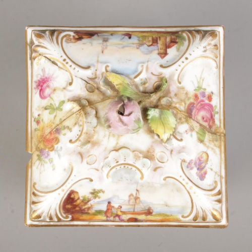 41 - A 19th century porcelain box with cover. With hand painted decoration of landscape scenes and floral... 