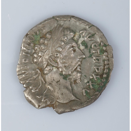 482 - A Marcus Aurelius silver Denarius. The reverse depicting Mars walking to the right with spear, COS I... 