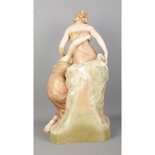 50 - A large Royal Dux figure group, two maidens. Height 51cm.