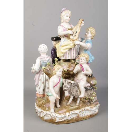 51 - After Meissen, a continental figure group, The Bucolic Festival. Marked to base with R and crossed s... 