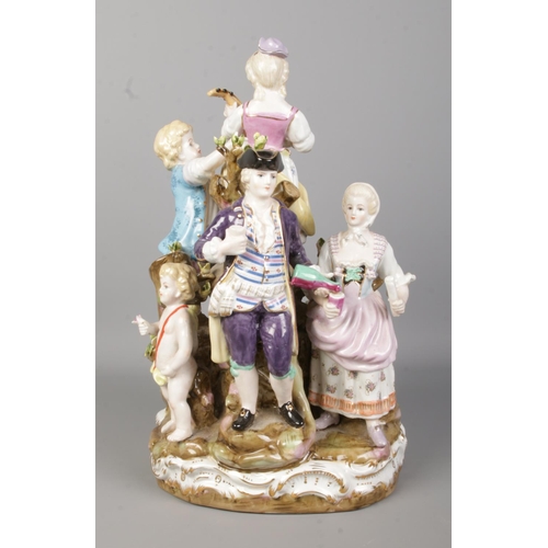 51 - After Meissen, a continental figure group, The Bucolic Festival. Marked to base with R and crossed s... 