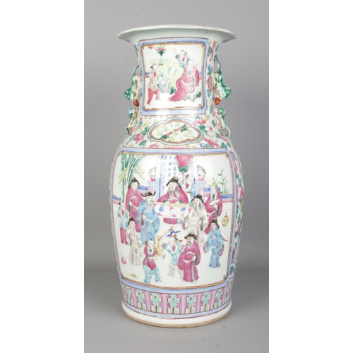 54 - A late 19th/early 20th century Chinese famille rose vase decorated in coloured enamels. Height 45cm.