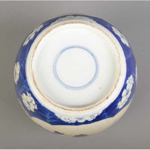 58 - A Chinese blue and white ginger jar decorated with birds and flowers. Having concentric circles to b... 