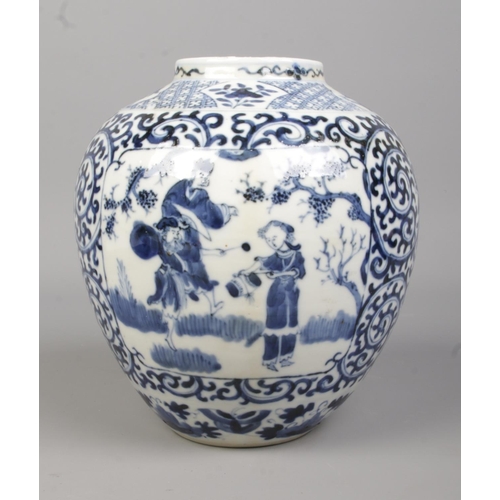 59 - A 19th century Chinese blue and white jar. Decorated in underglaze blue with figures. Four character... 