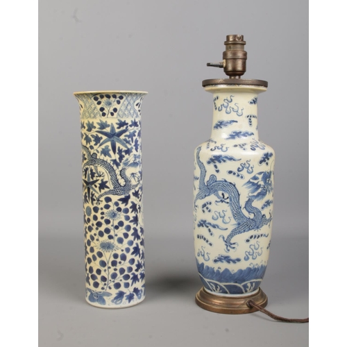 69 - A 19th century Chinese blue and white sleeve vase with four character mark to base along with a simi... 