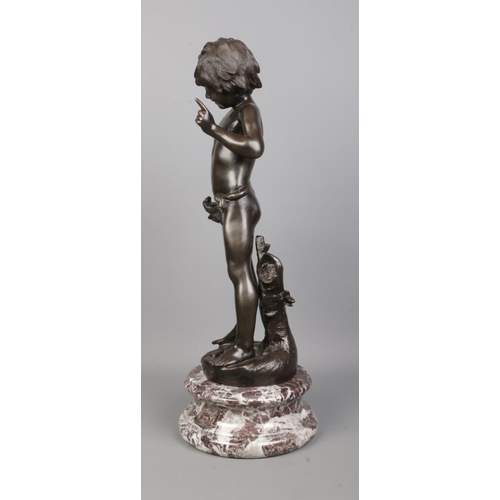 72 - After Auguste Moreau, a bronze sculpture of a boy holding a branch with birds and having a flute at ... 