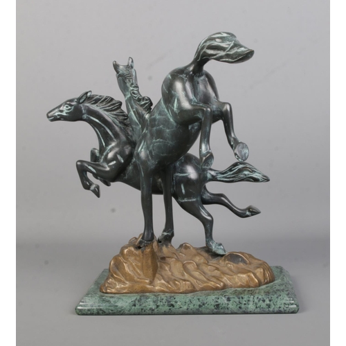 73 - A Verdi Gris bronze sculpture modelled as two frolicking horses raised on marble base. Height 30.5cm... 