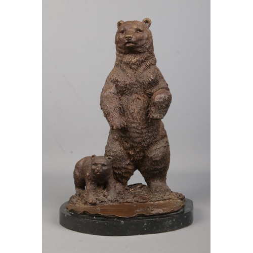 74 - A bronze sculpture modelled as a standing bear with bear cub, on marble base. Signed Mene. Height 31... 