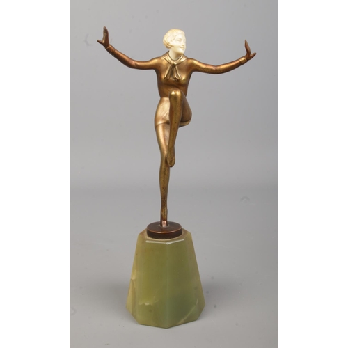 75 - Josef Lorenzl (1892-1950), a bronze and ivory figure, modelled as a dancer, raised on onyx base. Hei... 