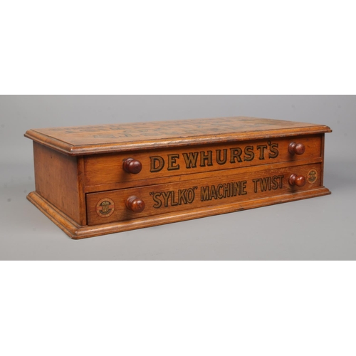 78 - A Dewhurst's Sylko Machine Twist oak two drawer table top box.