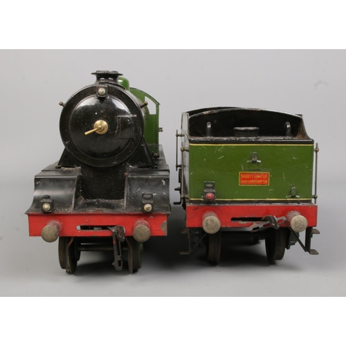 79 - A Bassett Lowke 0 gauge 2-6-0 locomotive with tender. With original wooden box.