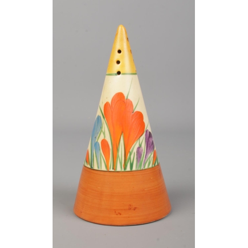 8 - A Clarice Cliff Bizarre conical sugar shaker decorated in the Crocus design. Height 14cm.