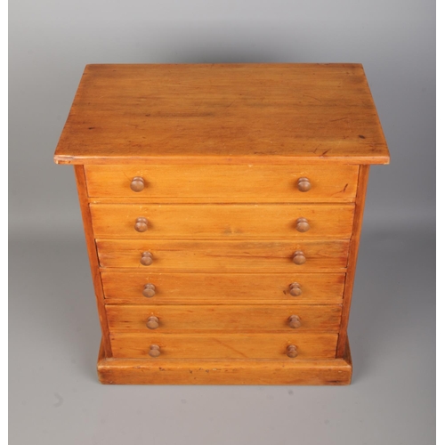 80 - Entomology, a pine specimen chest with six drawers of pinned butterflies under glass. Bearing Natura... 