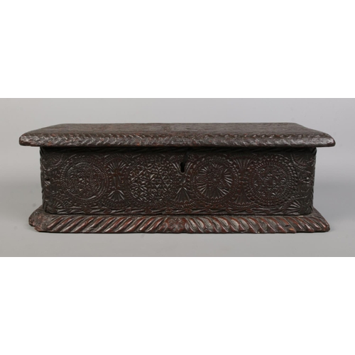 89 - A period carved oak box. Height 15cm, length 48cm, depth 22cm.