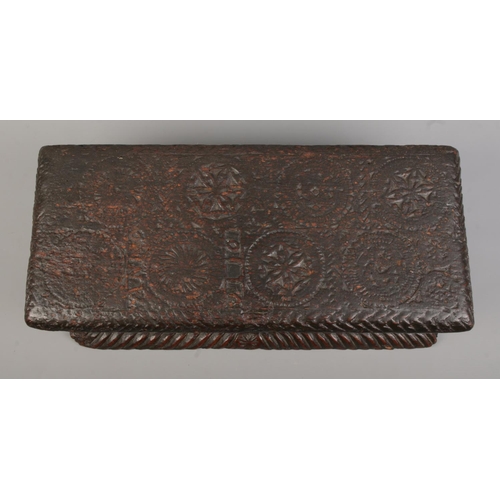 89 - A period carved oak box. Height 15cm, length 48cm, depth 22cm.