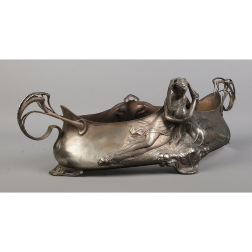 93 - A WMF silver plated centrepiece/planter. Decorated in relief with an embracing couple. Stamped WMF O... 