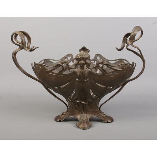 96 - A WMF centre piece/planter decorated to both sides with a semi nude fairy. Stamped WMF to base. Widt... 