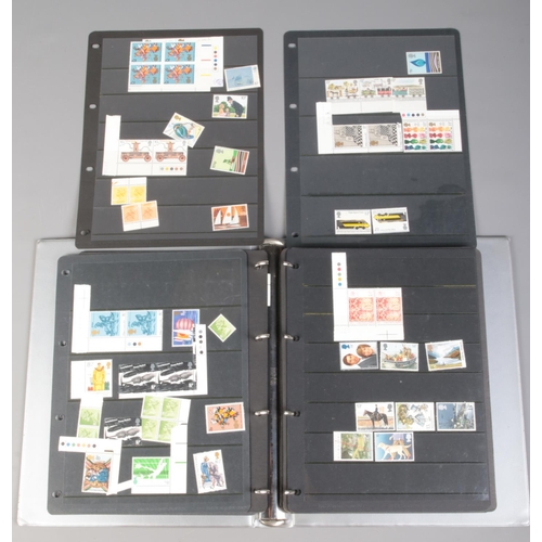 496 - An album of mint/unused British stamps. Includes GPO Definitive Issue Low and High Value presentatio... 